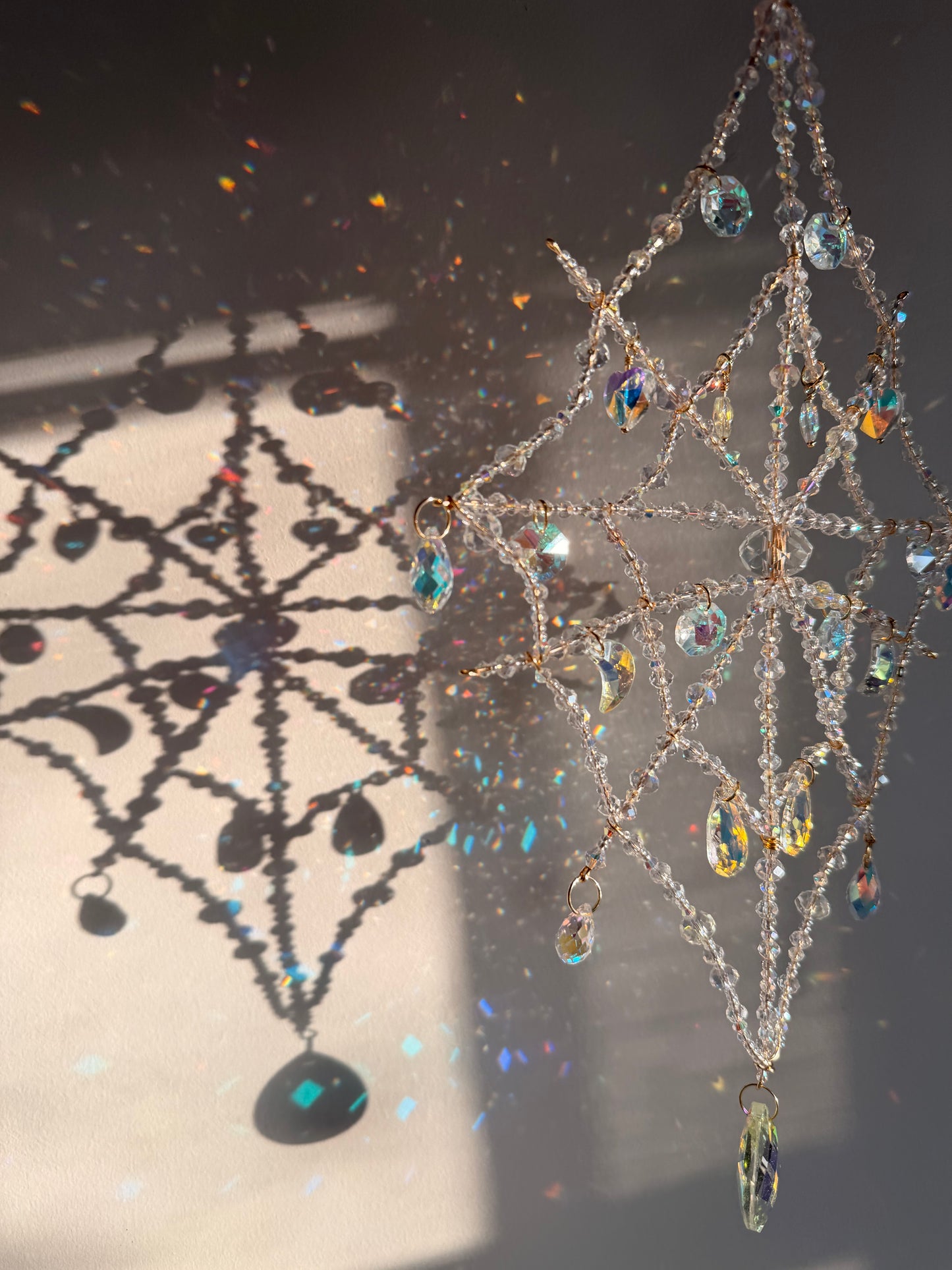 Tear drop spider web suncatcher