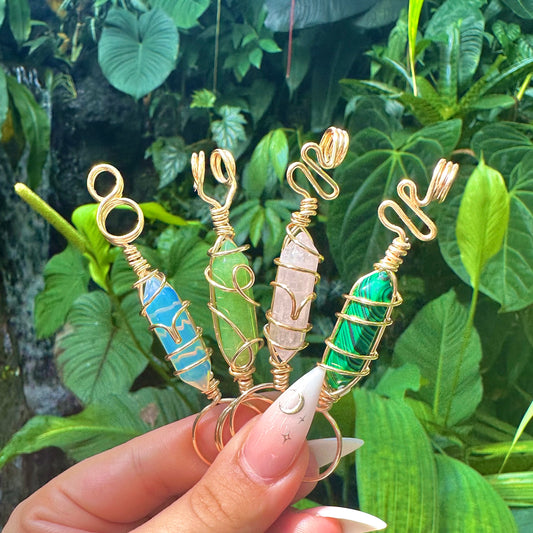 Personalized Crystal Point Smoke Rings, available in a variety of options, from metal color, Wire design, tip style and crystal type. Available in Rose Quartz, Aventurine, Opalite, Malachite, Amethyst, Obsidian, Carnelian, Sodalite and Tiger Eye