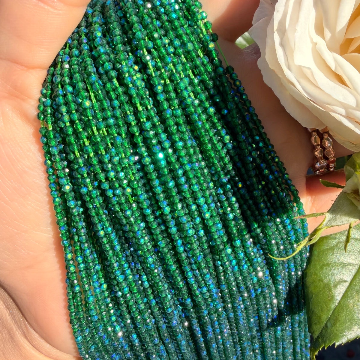 Poison Ivy | 2mm faceted Emerald green with blue iridescent ab finish