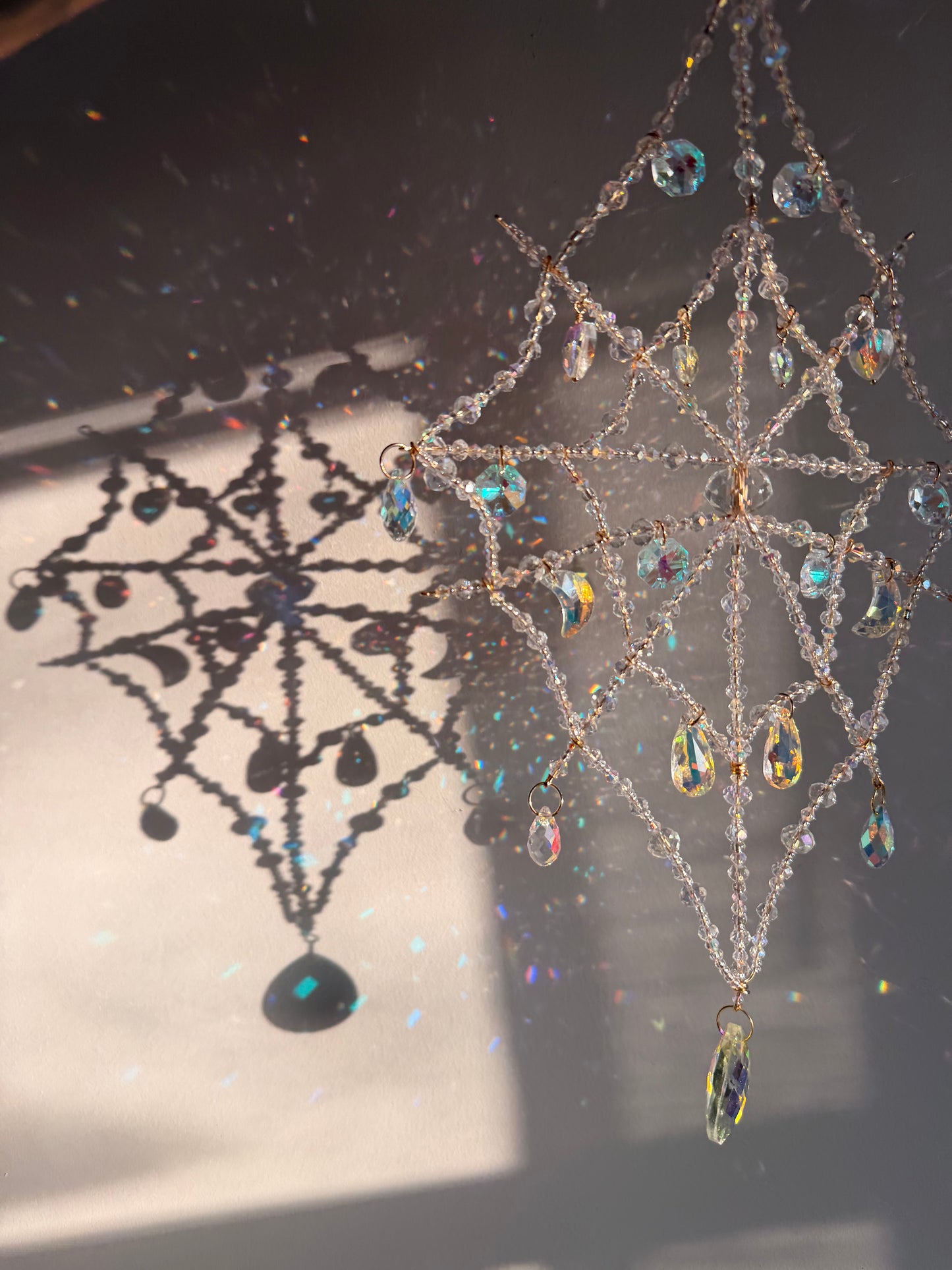 Tear drop spider web suncatcher