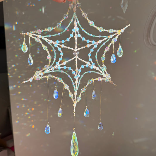 Woven in starlight | spider web suncatcher