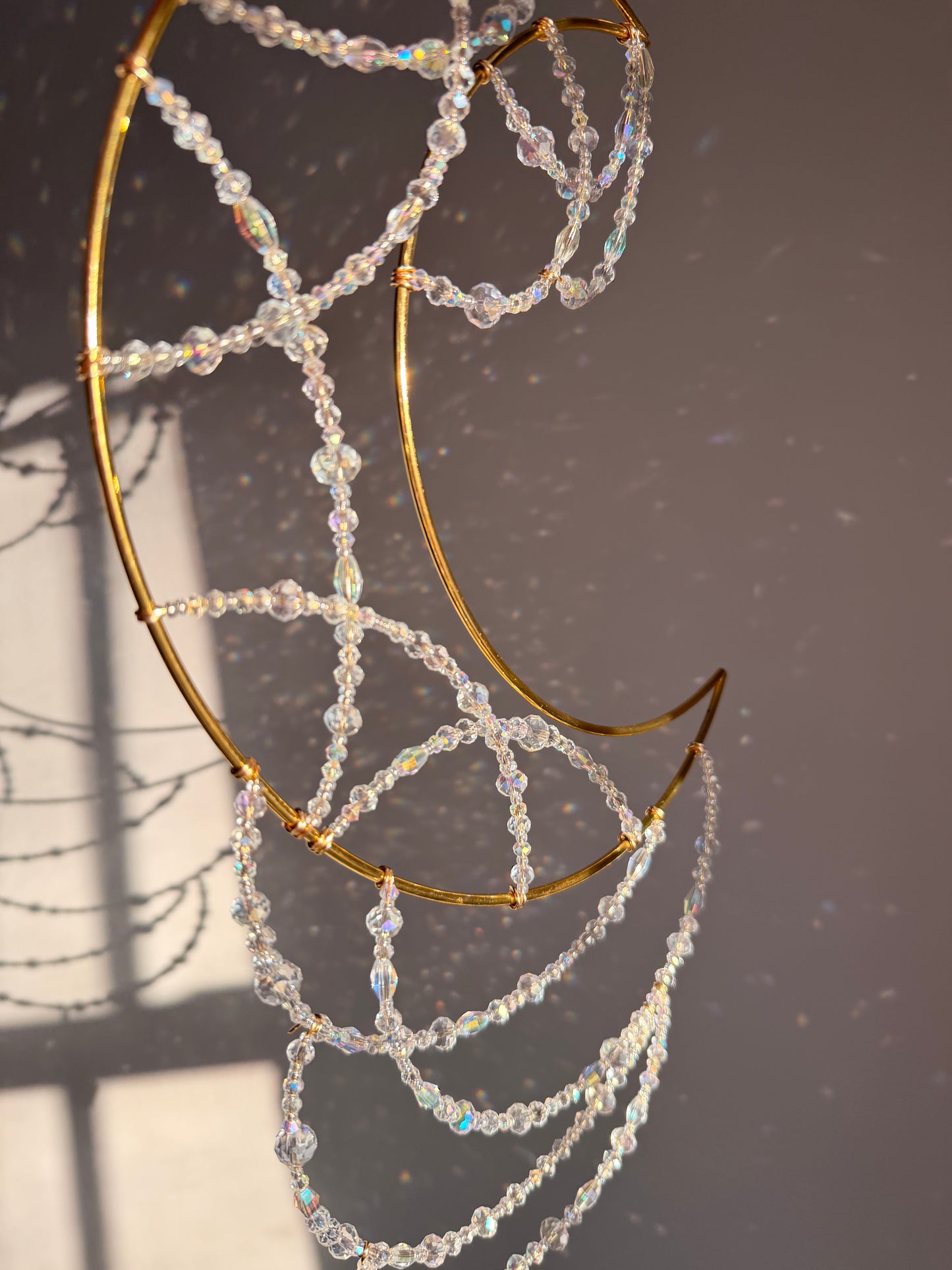 Celestial moon spider web suncatcher