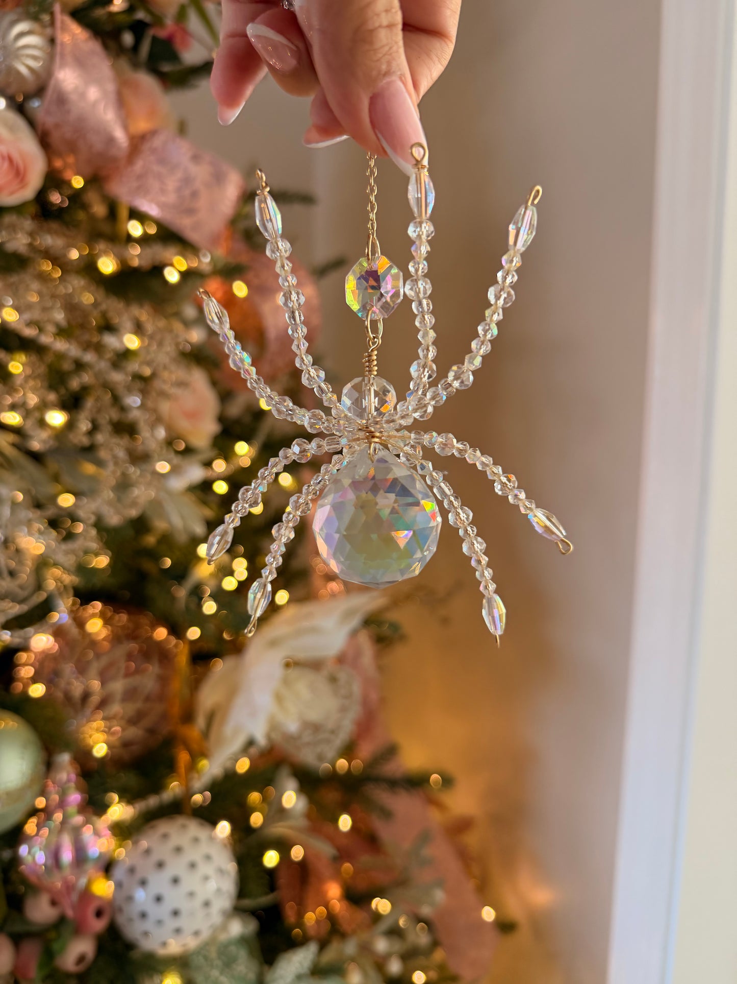 ￼ Iridescent spider suncatcher