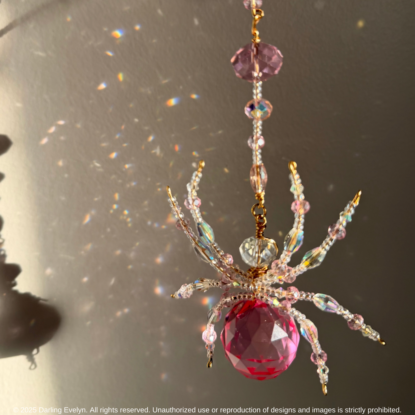 Handmade pretty in pink spider web suncatcher