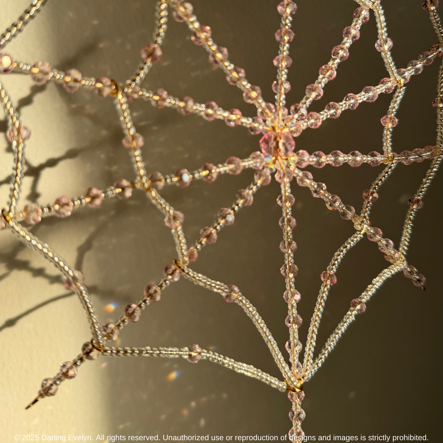 Handmade pretty in pink spider web suncatcher
